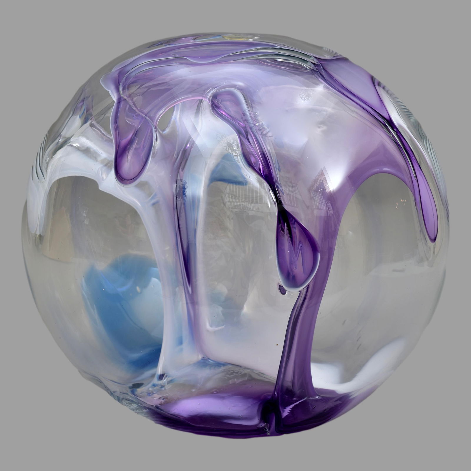 Peter Bramhall Signed Hand Blown Glass Orb Sculpture: Dated August 1988. Dimensions: 13"Diam. x 12 1/2"H Town Auction House & Gallery offers local delivery to Manhattan, Connecticut and Westchester for most items excluding large furniture. For a price qu