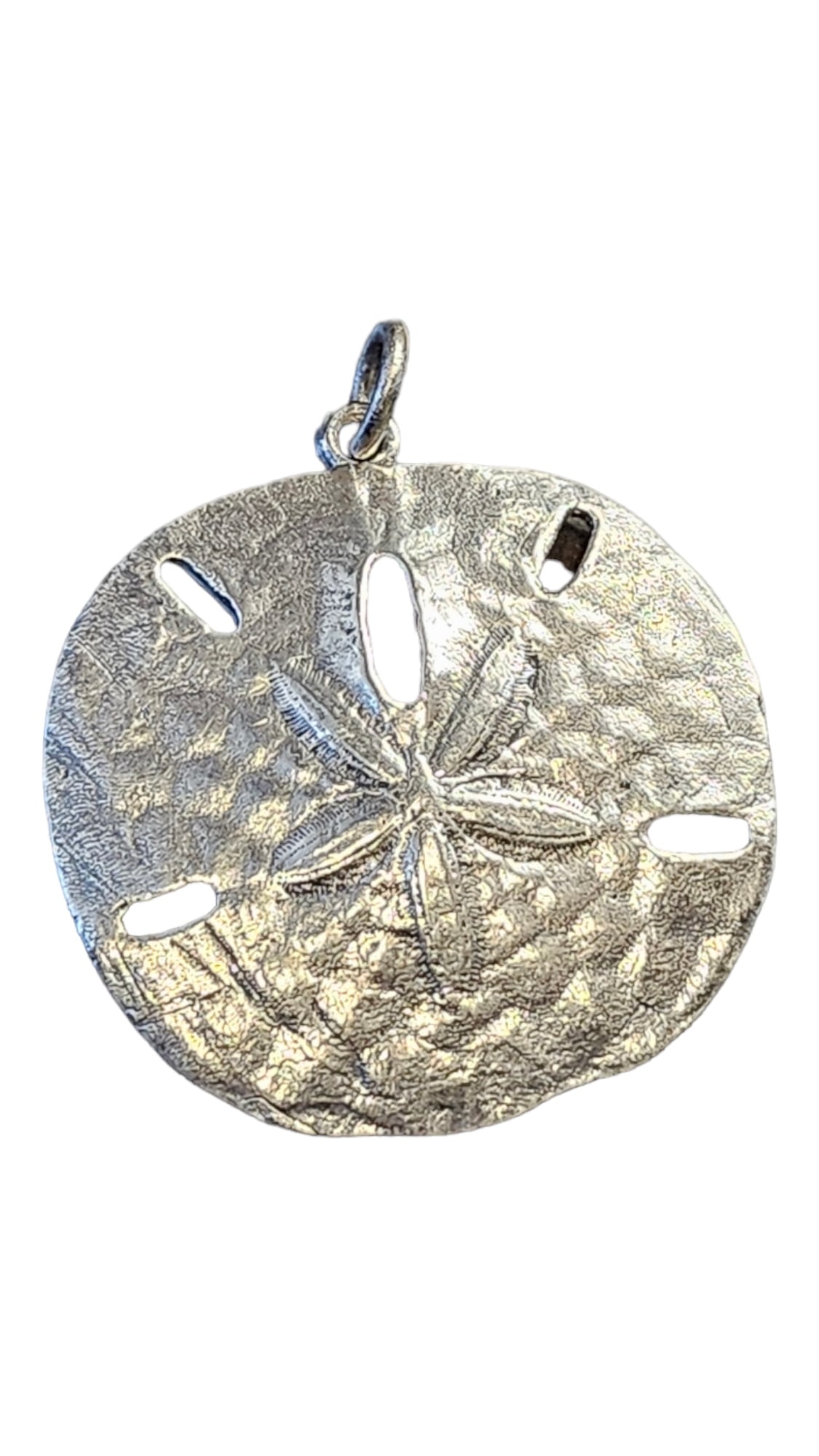 James Avery Large Sand Dollar Sterling Silver Pendant: James Avery Large Sand Dollar Sterling Silver Pendant. This is a retired pendant.