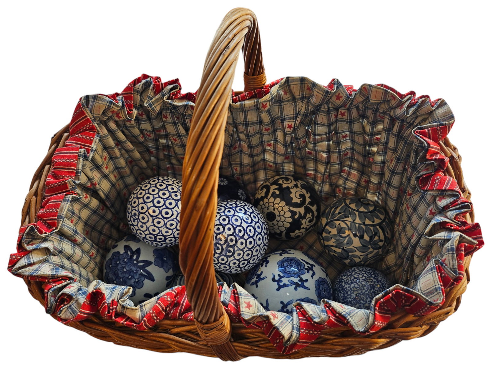 Basket Containing Carpet Balls: Basket Containing Carpet Balls. Set of 10 blue and white ceramic carpet balls.