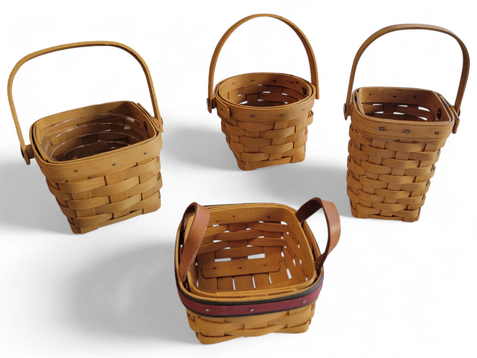 Group of 4 Smaller Longaberger Baskets: These baskets date from 1997,98,99, and 2003.