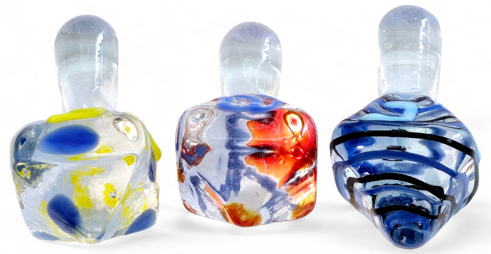 Set of 3 Hand Blown Glass Dreidels: Multi colored hand blown glass dreidels.
