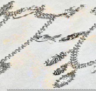 Sterling Silver James Avery Charm Bracelet w/ 8 Charms: Sterling Silver James Avery Charm Bracelet w/ 8 Charms. Some of these charms are retired.