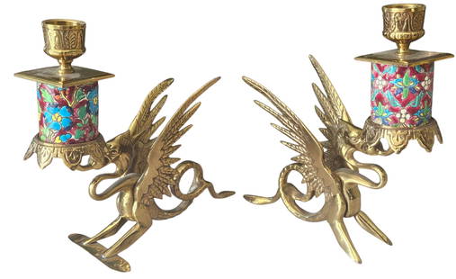 Pair French Longwy Griffin Brass Candlesticks: Pair of French Longwy Griffin Brass Candlesticks. On of the griffins has a fixed plate on the foot. Also, both have different floral patterns. Width 8" Height 7.25"