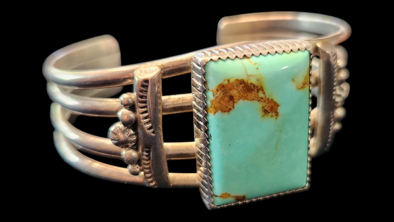 Wydell Billie Sterling Silver Turquoise Bangel 34.4 Grams: Wydell Billie is a Navajo silversmith known for crafting striking turquoise and sterling silver jewelry, especially cuff bracelets and bangles that showcase traditional artistry with a clean, elegant