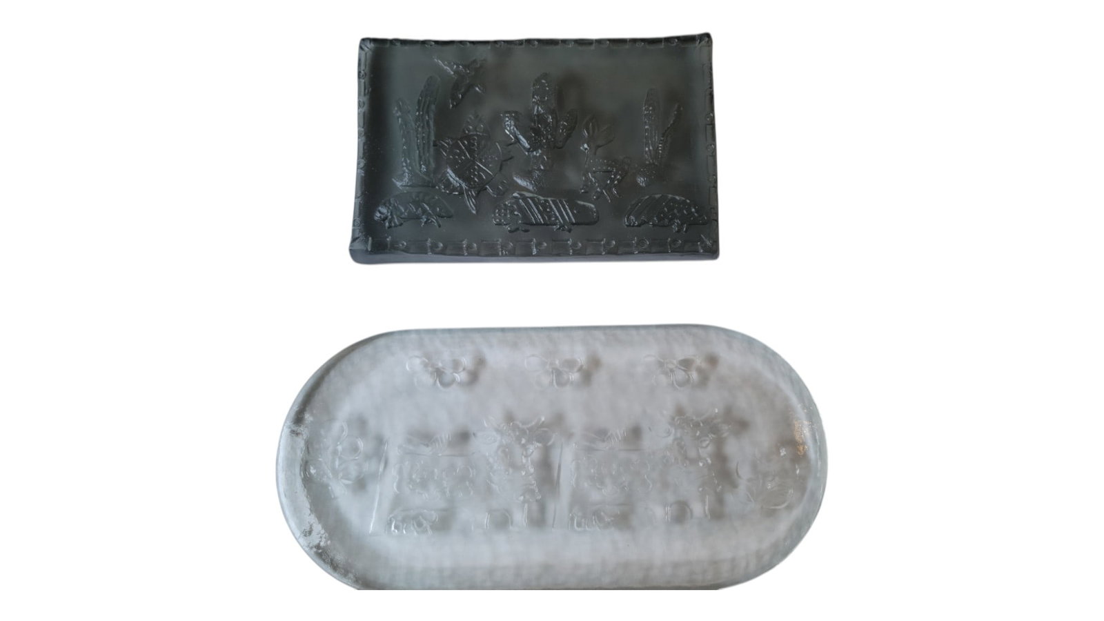 Glass Trivet/ Paperweight Scenes: One has a depiction of a cow with butterflies. The other glass scene is with cactus.