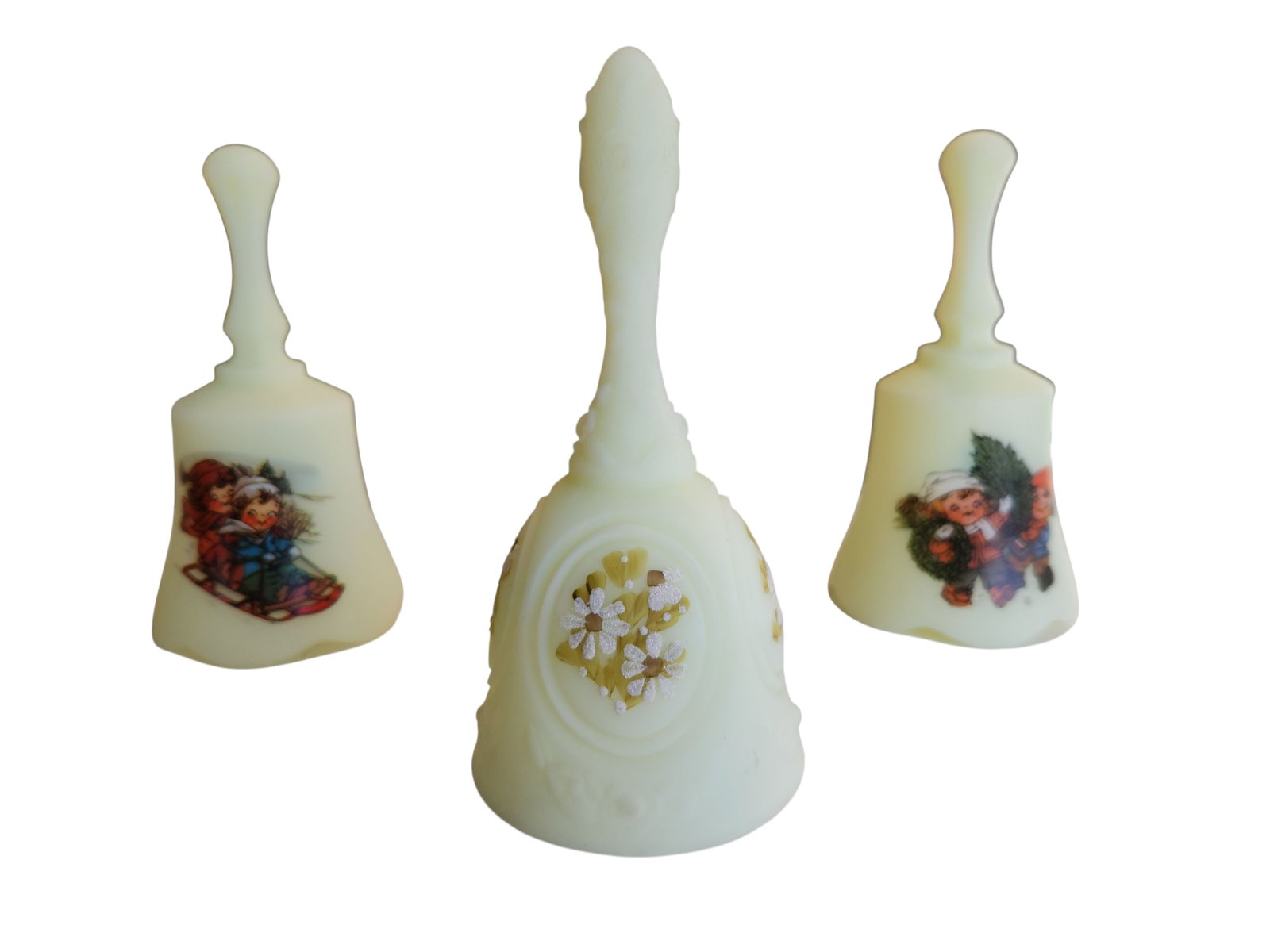 Set of Uranium Glass Fenton Bells: Set of Uranium Glass Hand Painted Fenton Bells. The one in the front center is hand painted and hand signed on the underside of the bell. Other are a little newer and have a sticker. Height 6.5" All g