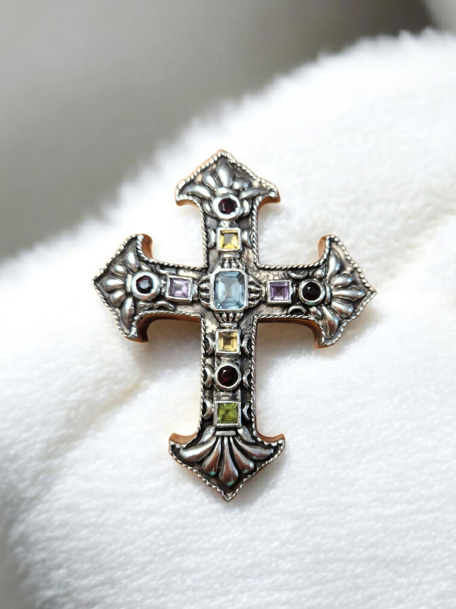 Ornate Sterling Silver Cross Pendant w/ Semi Precious Stones, 54.9 Grams: Show Stopper, this is a heavy cross pendant. The stones test as Citrine, and Garnet. Ornate Sterling Silver Cross w/ Semi Precious Stones, 54.9 Grams The cross is 3" in height