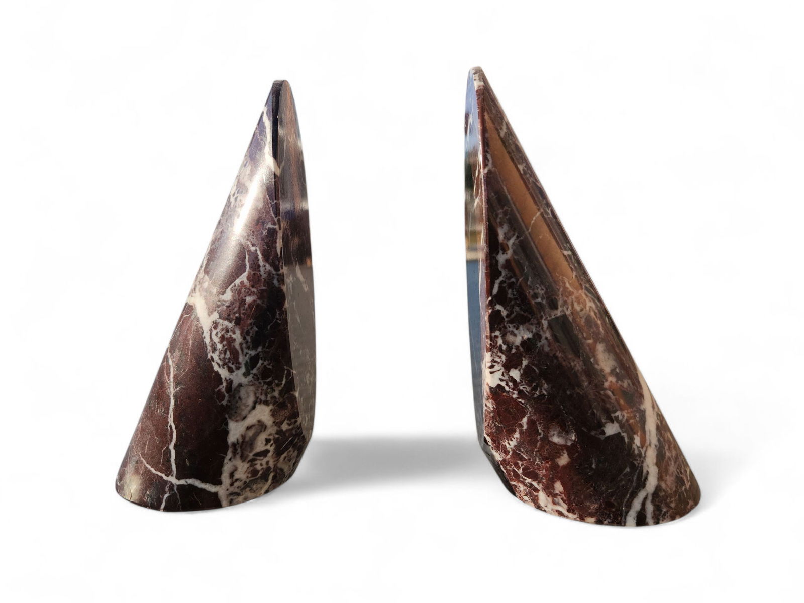 Contemporary Deep Red Marble Bookends: Contemporary Deep Red Marble Bookends, This is a lovely pair of rounded wedge style marble books ends with white veins running throughout. Height 7" 4"