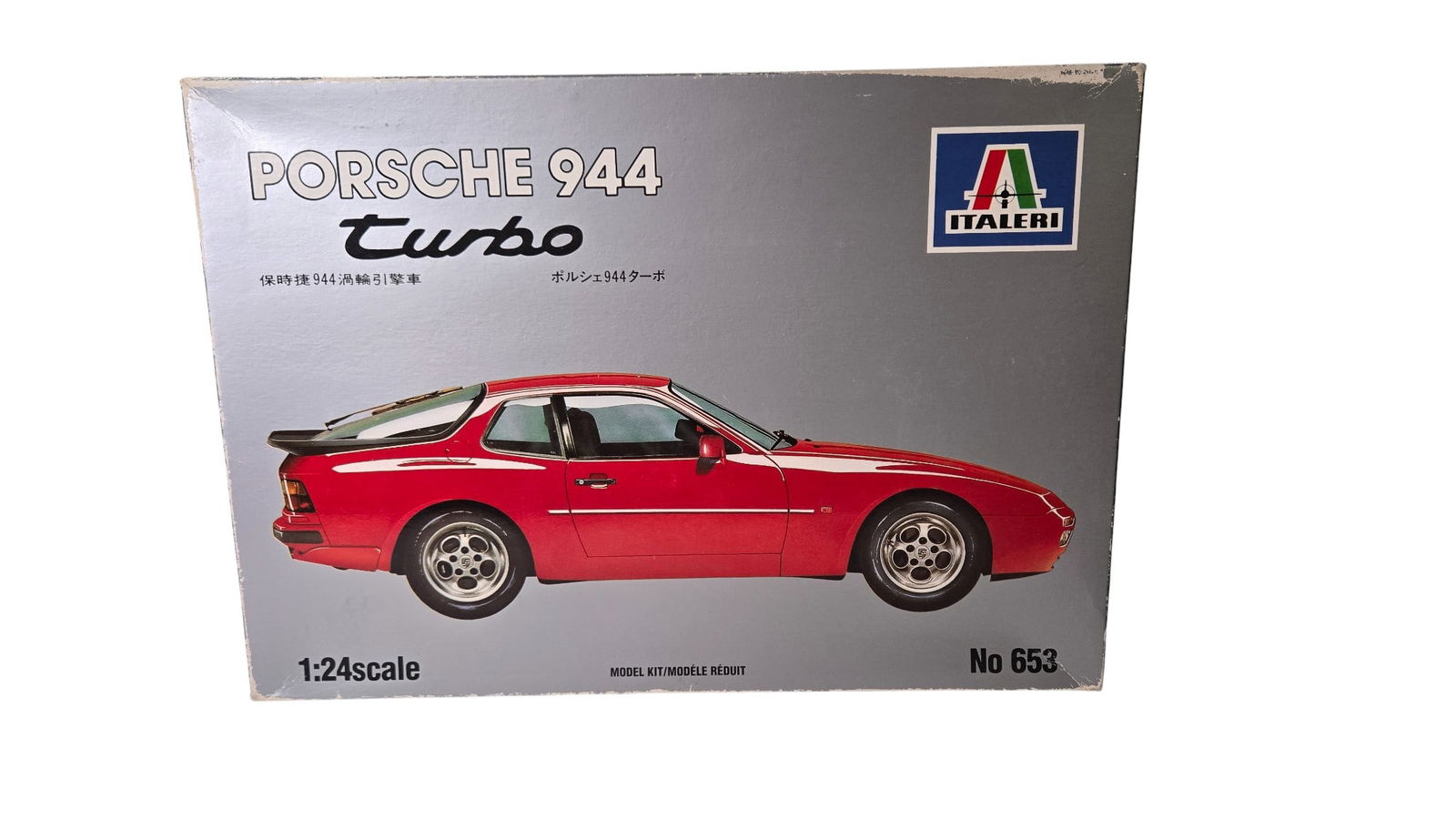 Porsche 944 Turbo - Italeri No. 653 1:24 Scale Model Kit: Porsche 944 Turbo - Italeri No. 653 1:24 Scale Model Kit Red sports car. Opened Box. All parts included, but parts bag open. Made in Italy.