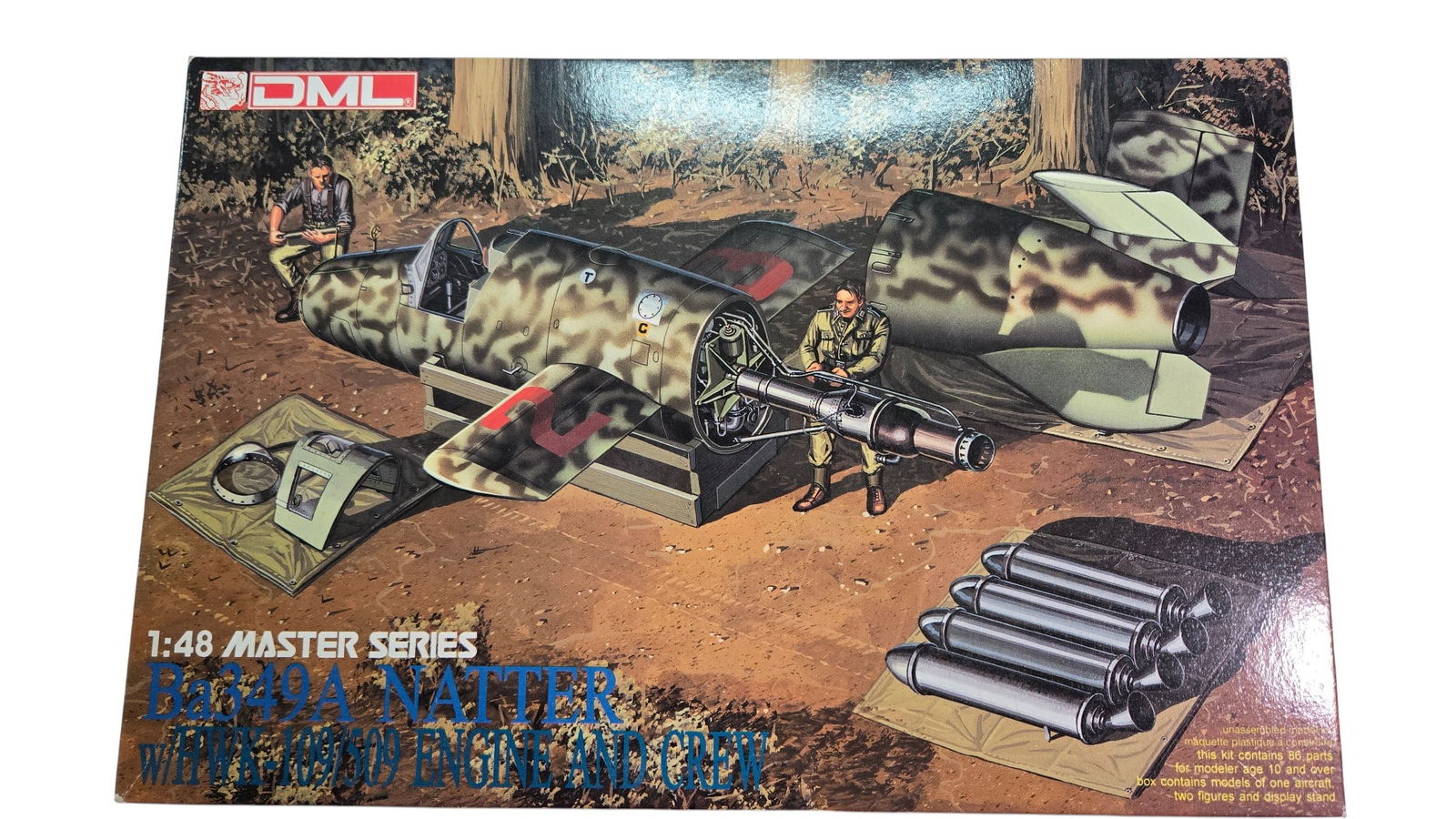 DML Master Series Ba349A Natter w/HWK-109/509 Engine & Crew No. 5525 1:48 Model Kit: DML Master Series Ba349A Natter w/HWK-109/509 Engine & Crew No. 55251:48 scale model kit. Made in Hong Kong. Copyright 1995 Marco Polo Import, Inc. Opened Box. Sealed parts bags.