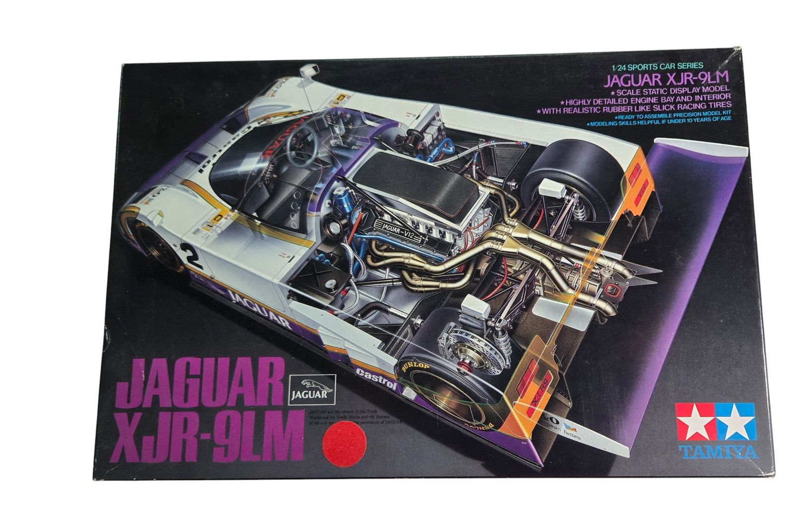 Jaguar XJR-9LM Model Kit by Tamiya 1:24 scale: Jaguar XJR-9LM Model Kit by Tamiya 1:24 scale. Opened box. Opened parts bags. Partially assembled. Great starter kit.