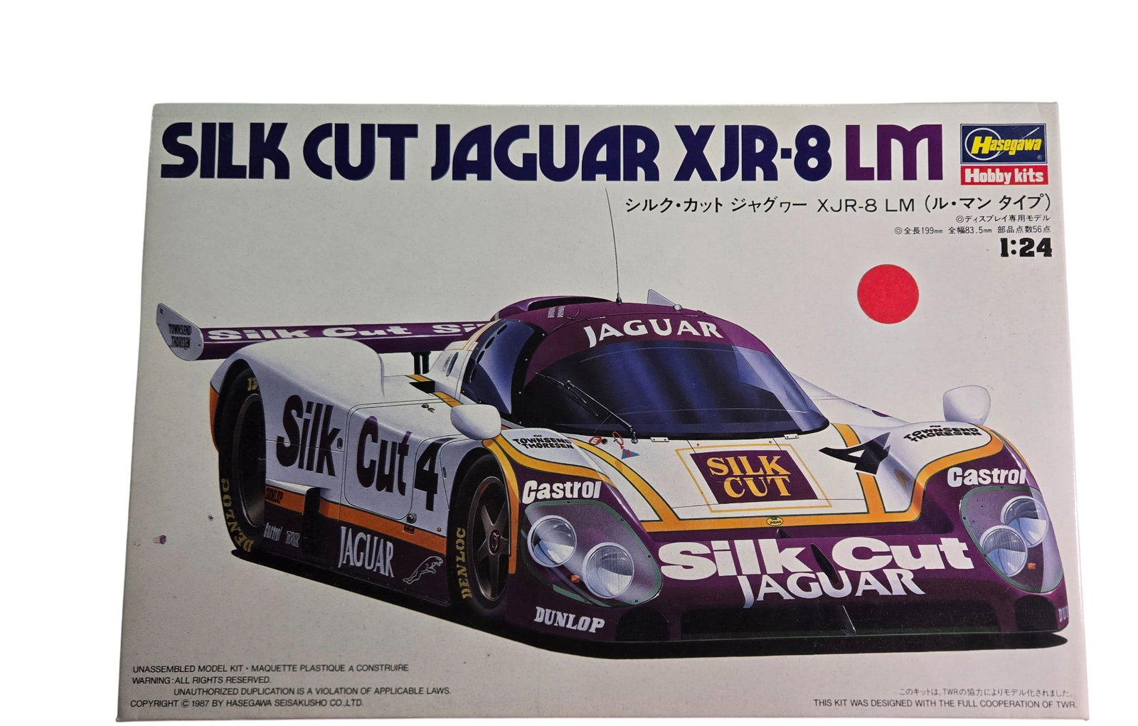 1987 Silk Cut Jaguar XJR-8 LM by Hasegawa Hobby Kits 1:24 scale: Silk Cut Jaguar XJR-8 by Hasegawa Hobby Kits 1:24 scale. Opened box. Partially completed. 1987.