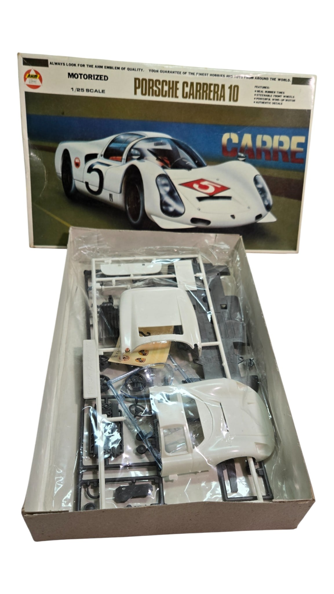 Eidai Porsche Carrera 10 Motorized 1/25 Scale Model Kit: Eidai Porsche Carrera 10 Motorized Model Kit 1/25 Scale Door & Engine Panels Open and Close, Steerable Front Wheels, Pre-Assembled Gear Box Made in Japan Part Bags Seals and instructions inclu