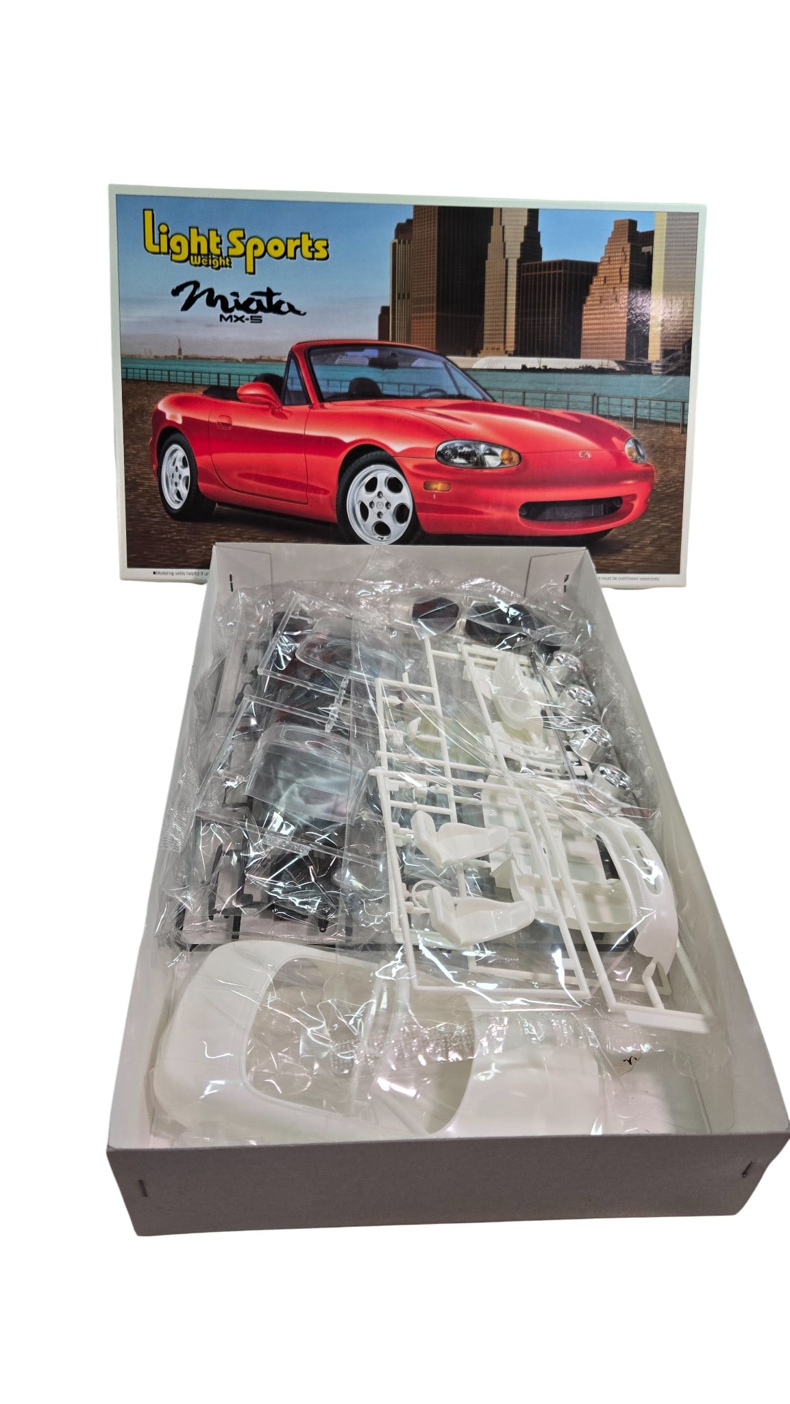 Aoshima Light Sports Weight Miata MX-5 Model Kit 1/24 Scale: Aoshima Light Sports Weight Miata MX-5 Model Kit 1/24 Scale Kit No. 021958 1500 Part Bags Sealed and instructions included