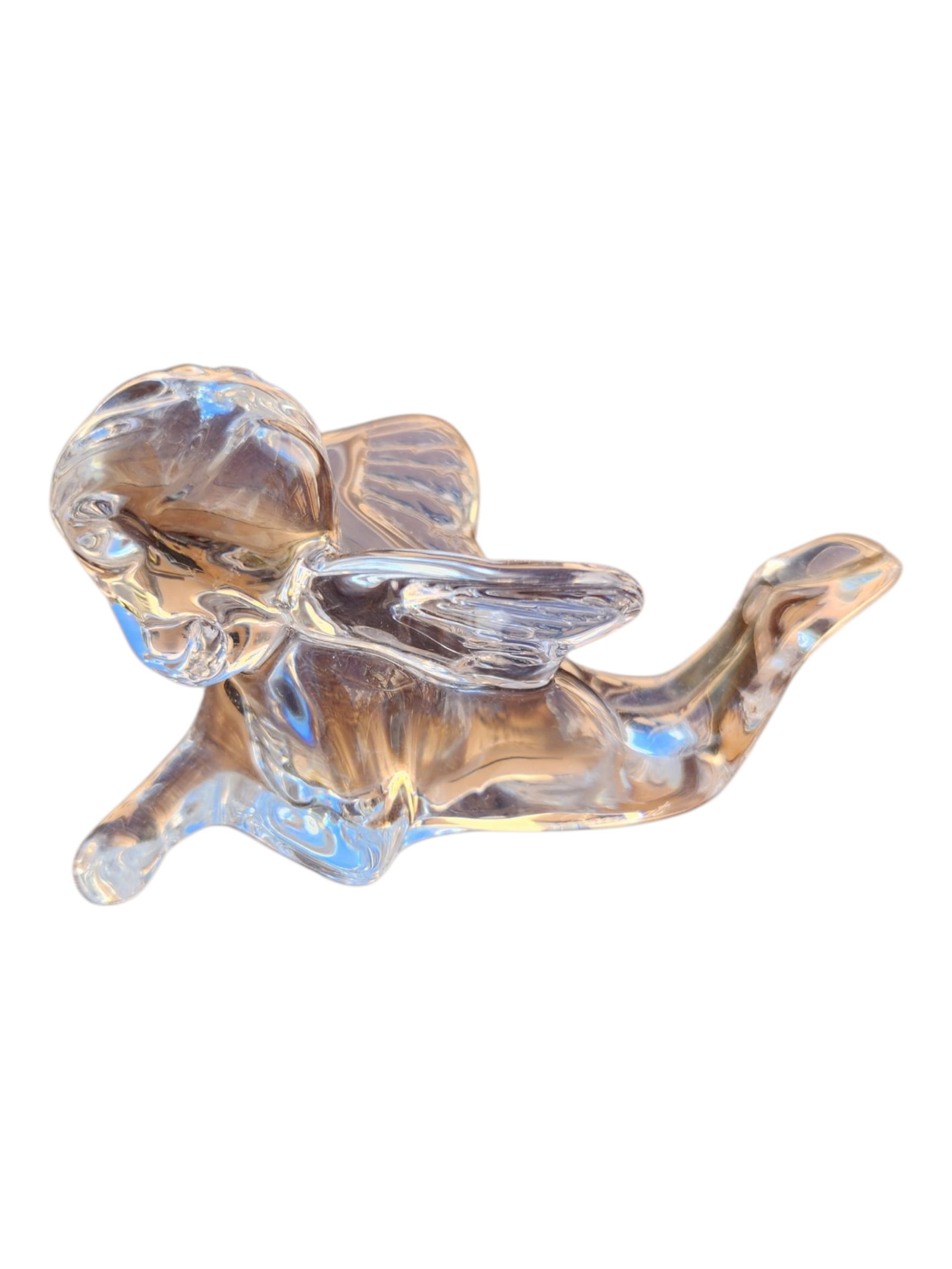 Baccarat Crystal Cherub Figurine: Baccarat Crystal Cherub Figurine laying in the prone position.