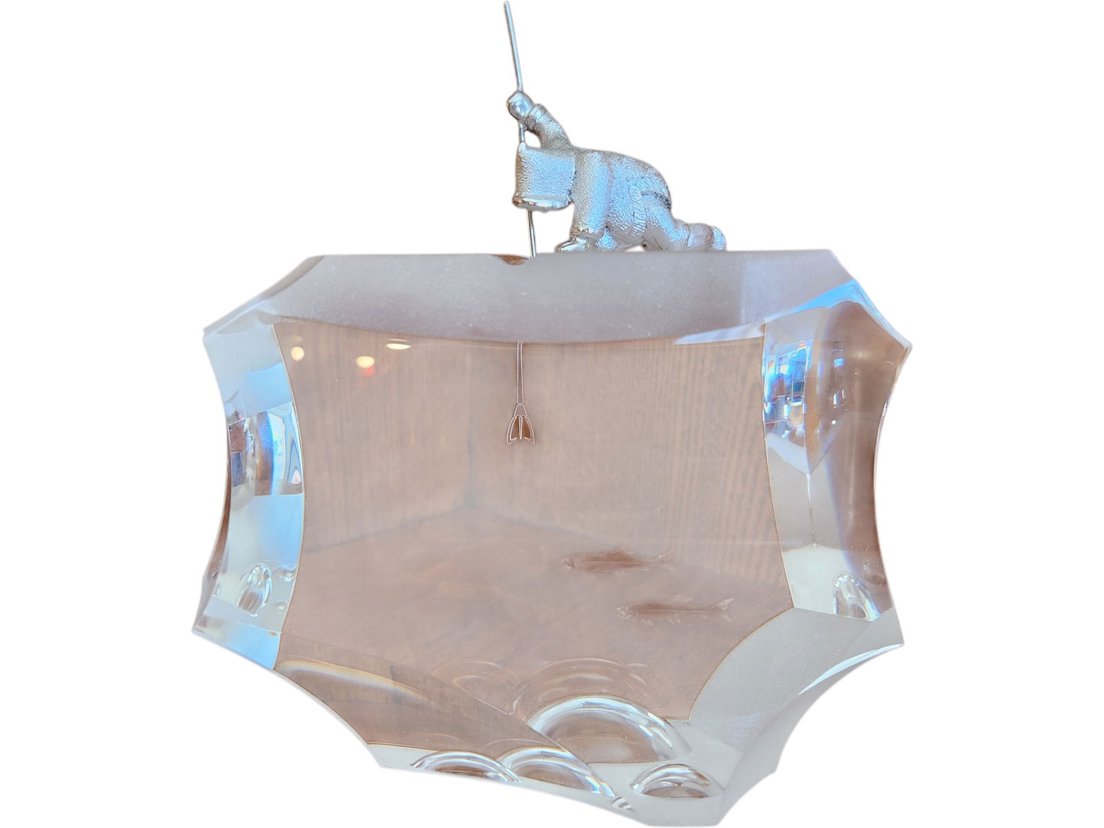 STEUBEN STERLING SILVER AND GLASS "ARTIC FISHERMAN" SCULPTURE - STEUBEN STERLING SILVER AND GLASS: STEUBEN STERLING SILVER AND GLASS "ARTIC FISHERMAN" SCULPTUREAmerican, 1970, designed by James Houston. Lead-glass and sterling silver, signed on the foot.6.7 x 6 x 2 1/2 in.