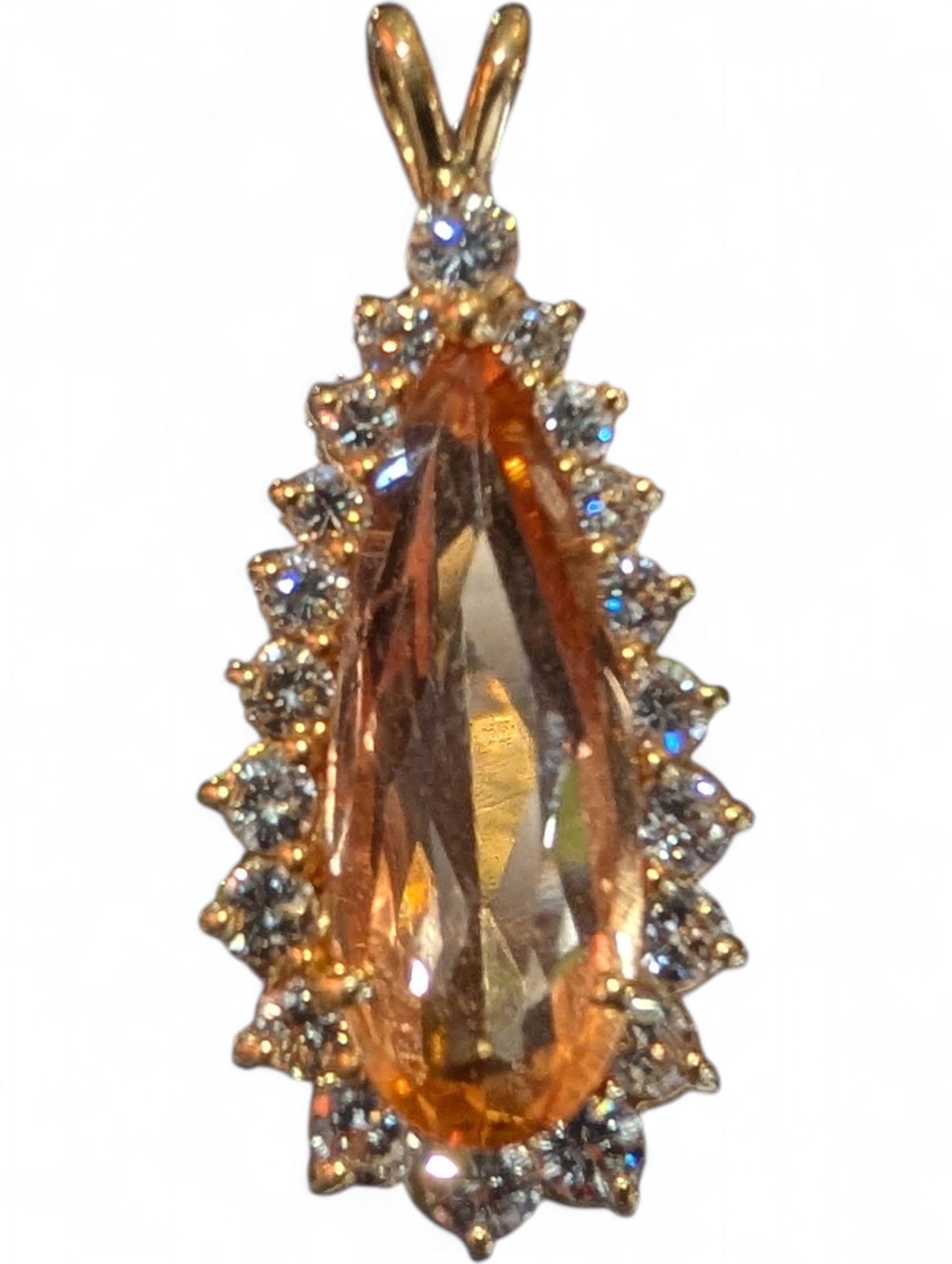 18kt Pear Cut Imperial Topaz Surrounded with Diamond Halo Pendant ~ 4.5 grams: Impressive pendant. Imperial topaz set in 18kt gold. Adjourned with with quality diamonds forming a halo around the piece. Height 1.25" approx.