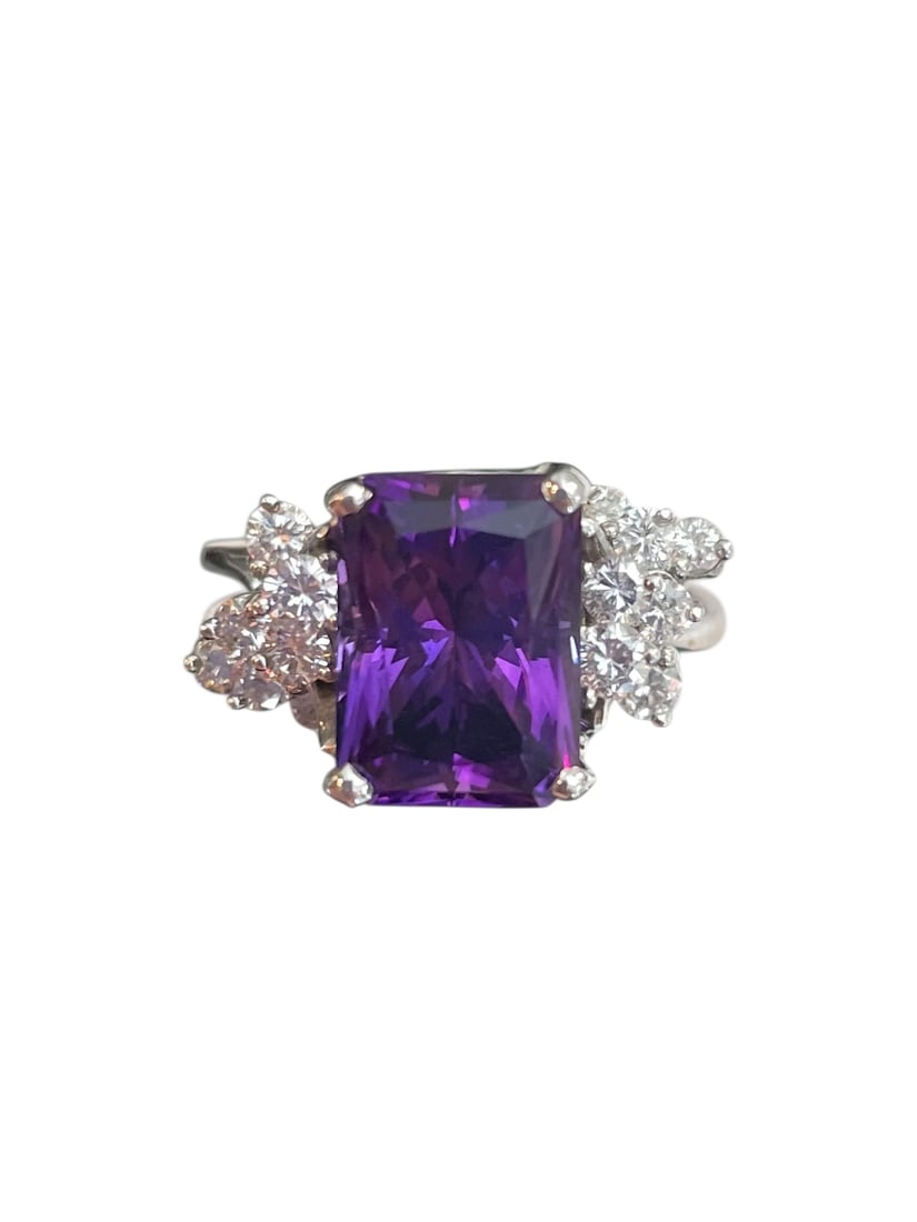 Purple Spinel and Diamond White Gold Ring, 14K ~ 6.1 grams: Purple Spinel and Diamond White Gold Ring, 14K ~ 6.1 grams A bright purple rectangular stone, likely spinel, surrounded with an ascending cluster of diamonds, a total of 14. White gold, marked
