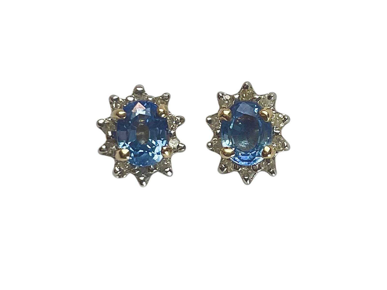 Small Sapphire and Diamond Earrings, 14K Gold ~ 1.2 grams: Small Sapphire and Diamond Earrings, 14K Gold ~ 1.2 grams Dainty cluster earrings, light blue sapphires surrounded with diamonds. Yellow gold including backs, marked 14K.