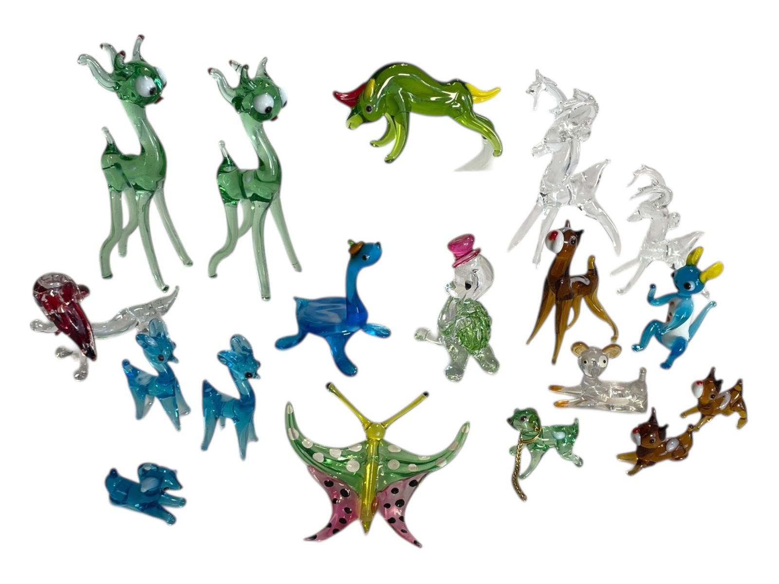 18 Small Blown Glass Animals: 18 Small Blown Glass Animals A chip on the larger clear deer and on one of the green deer. And the animal on far left in last photo is actually plastic. Approx. 1" to 4.5" tall