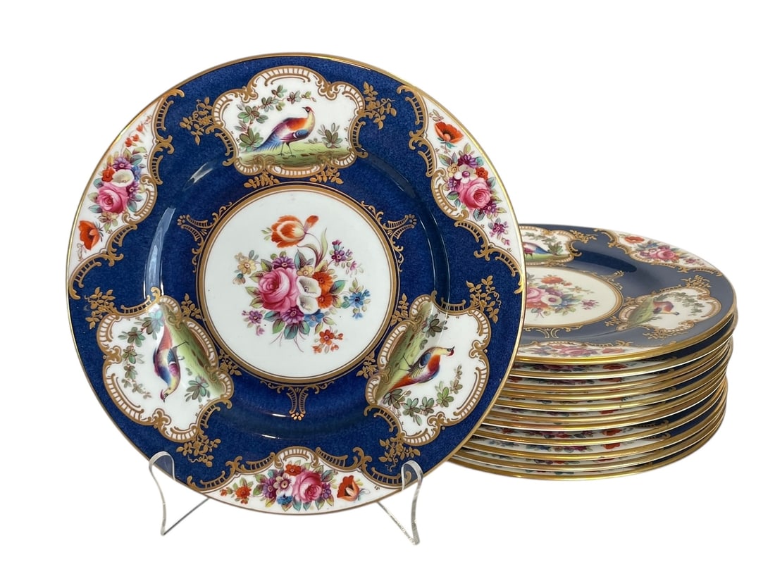 Set of 12 Crown Staffordshire Hand Painted Dinner Plates, Tiffany & Co.: Set of 12 Crown Staffordshire Hand Painted Dinner Plates, Tiffany & Co. Beautiful set with gold trim on cobalt blue background, each with hand-painted birds and floral cartouches. The painter's name i