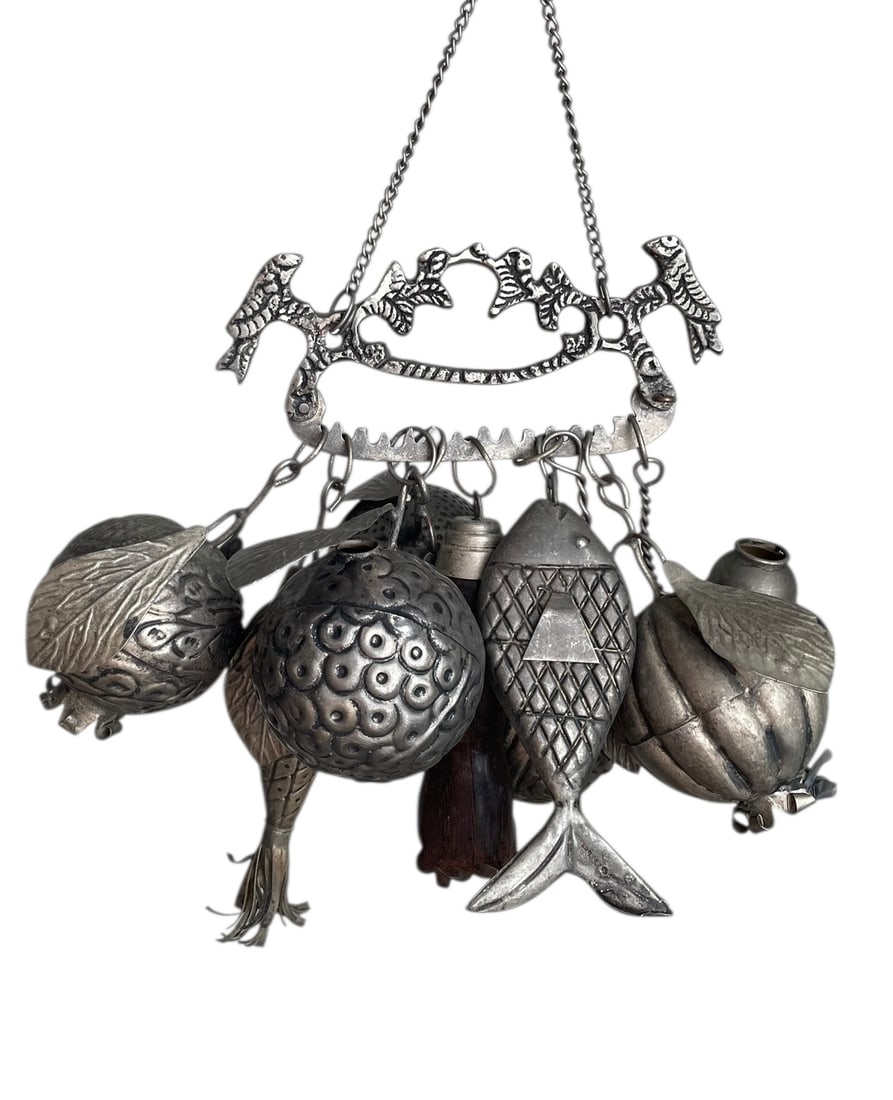 Brazilian Penca de Balanganda Slave Bells: Brazilian Penca de Balanganda Slave Bells. Note, these are not jewelry sized but larger. Eight metal objects including fruit and a fish, plus a carved wood fist. Marked: Ragastens Prata 90 Approx. 8"