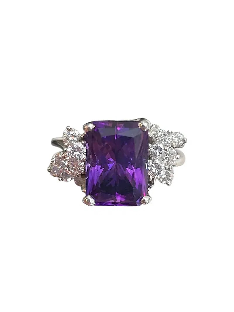 Purple Spinel and Diamond 14K White Gold Ring ~ 6.1 grams: Purple Spinel and Diamond 14K White Gold Ring ~ 6.1 grams. A bright purple stone, likely spinel according to the tester. It's surrounded with an ascending cluster of 14 diamonds. White gold, marked 14