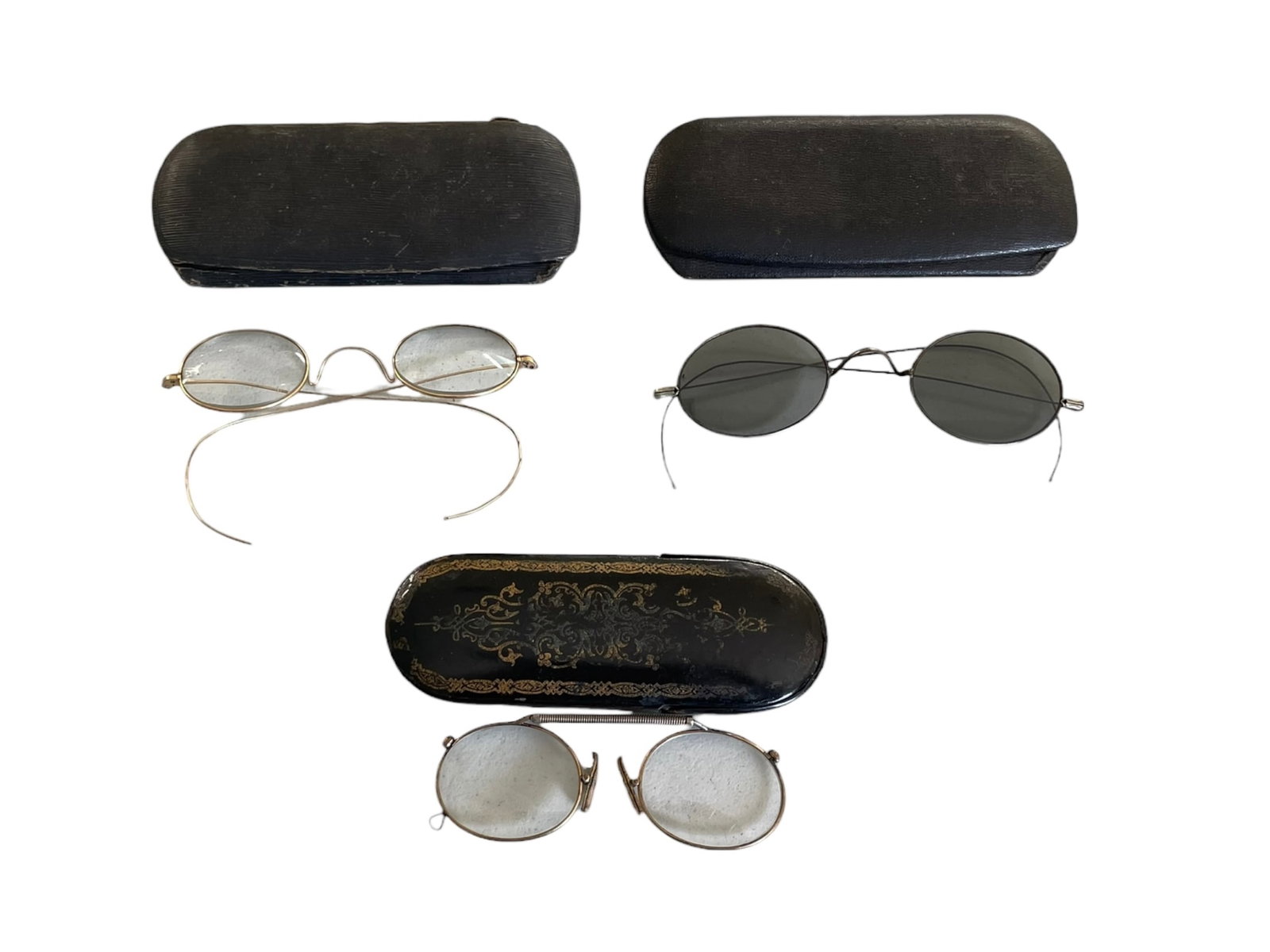 3 Pairs of Spectacles with Cases: 3 Pairs of Spectacles with Cases. The pince-nez pair has an unusual lacquered case. Another pair has gray lenses. The third pair is probably gold-filled (or even gold), marked only Beckmann. They