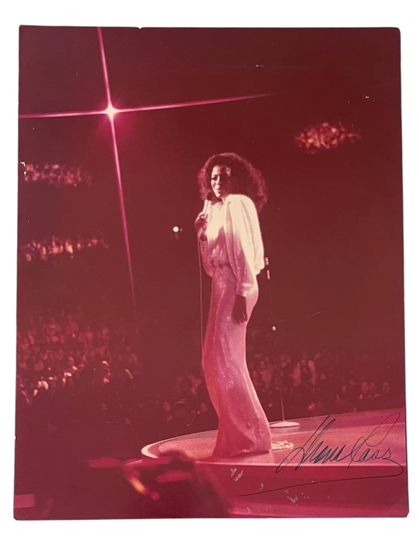 Diana Ross Autographed 11x14 Photo: Diana Ross Autographed 11x14 Photo. A vintage photo on backing board, signed Diana Ross in lower right. 11" x 14"