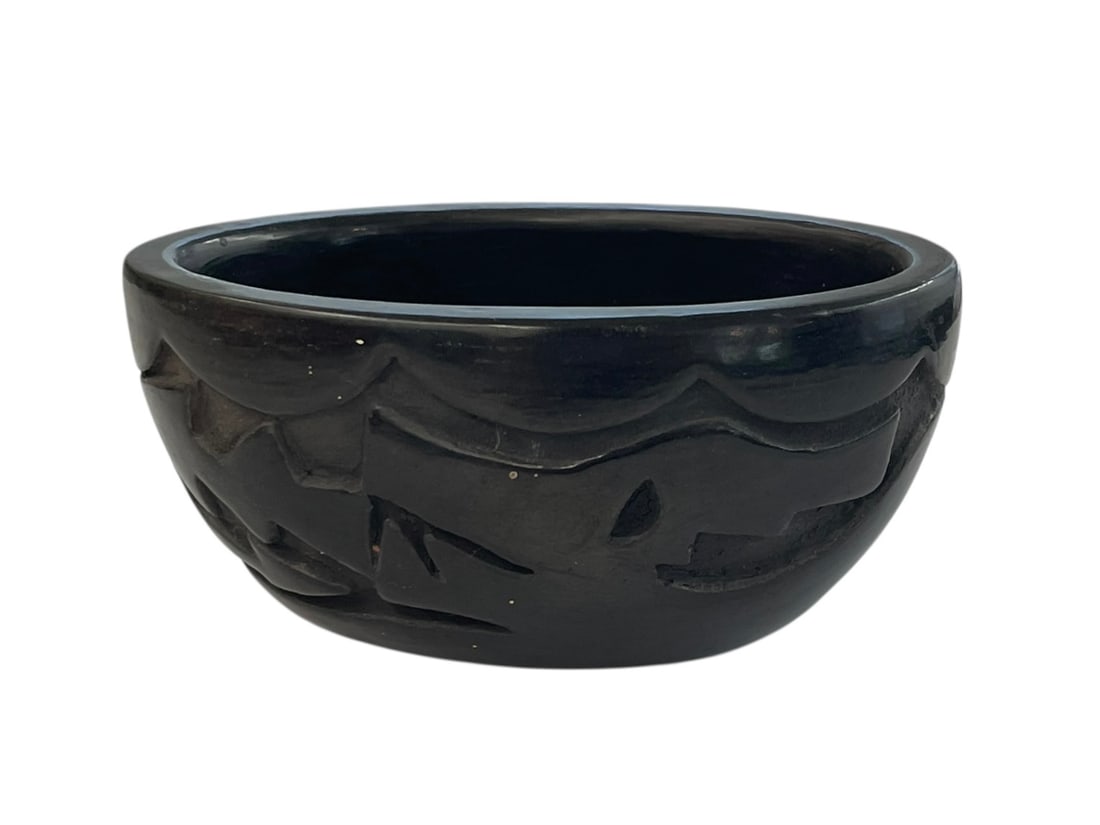 Reycita Cosen Santa Clara Pueblo Blackware Bowl: Small carved pottery oval bowl, signed on the bottom: Reycita Cosen / Santa Clara. 4 3/4" x 3 1/4", and 2 1/8" tall.