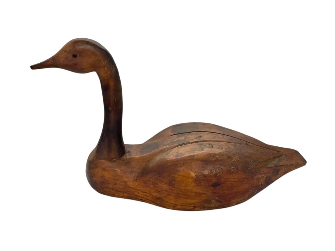 Folk Art Carved Goose Decoy: Hand made wood decoy, no signature found. Approx. 22" long and 13" tall.