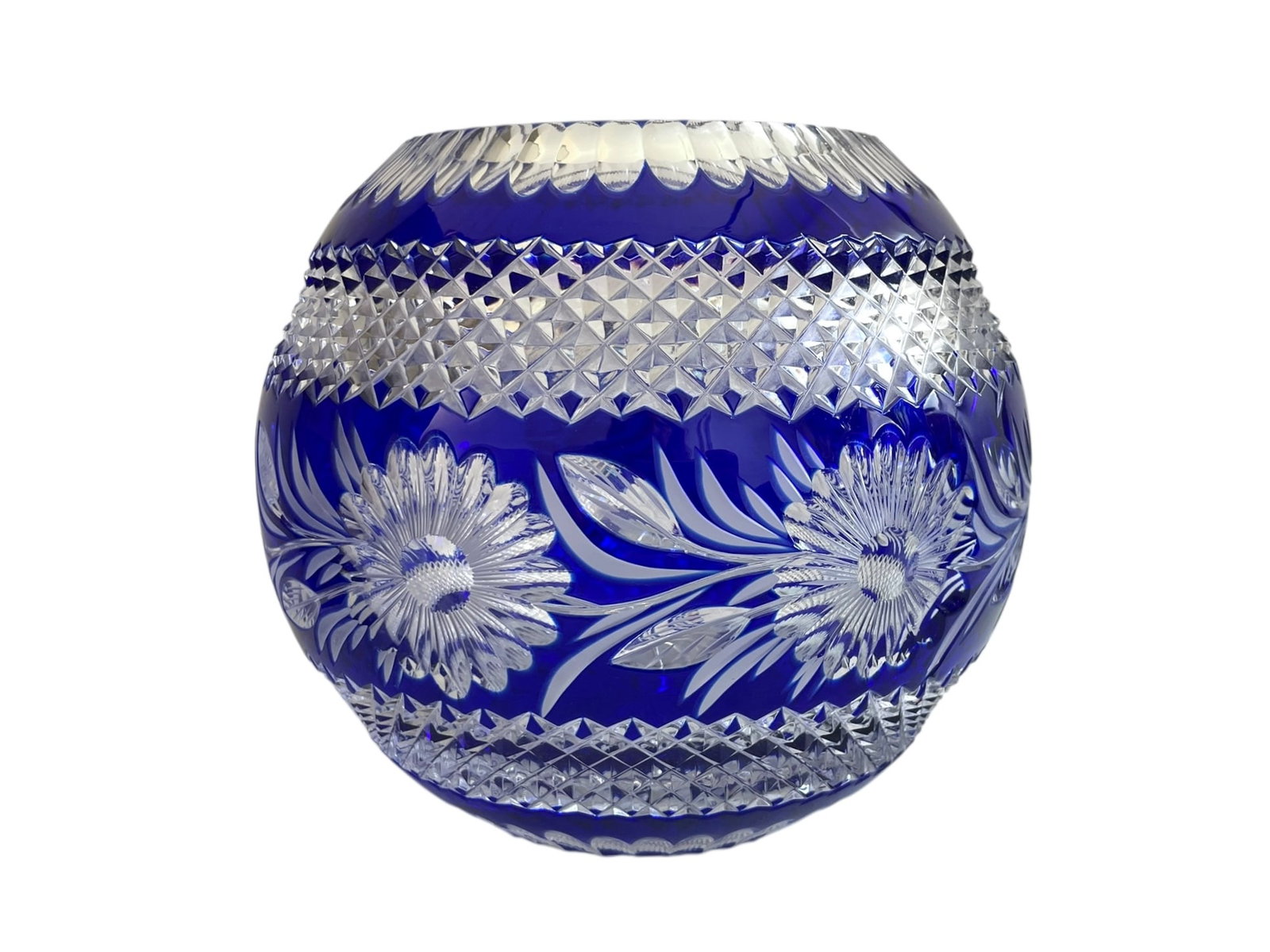 Bohemian Cobalt Cut to Clear Rose Bowl: Encircled with a pattern of daisies and leaves, beautifully cut crystal, no chips or cracks. 7" tall, about 8" diameter.