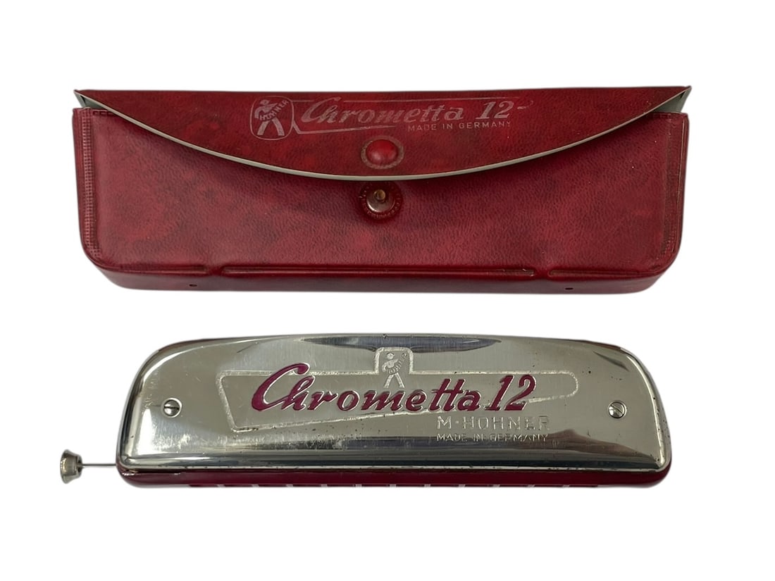 Chrometta 12 German Harmonica by M. Hohner: Hohner Chrometta 12 harmonica, made in Germany, original vinyl case, key of C, about 6" long.