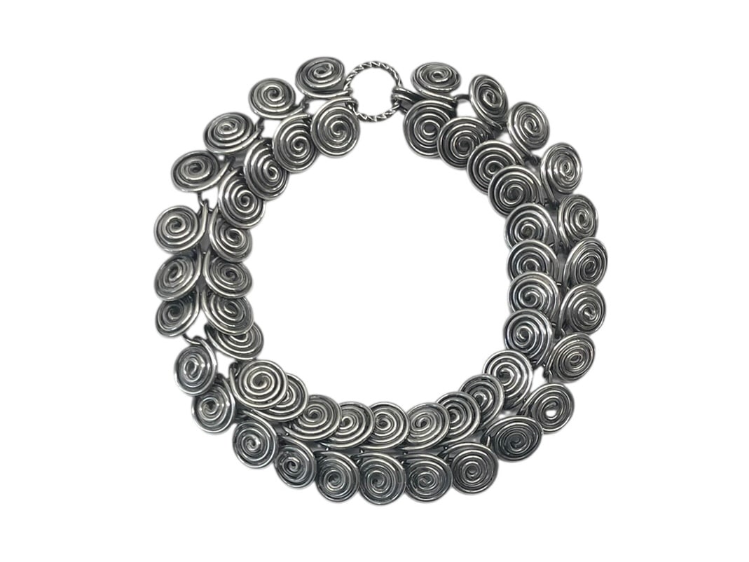 Sterling Silver Spiral Link Bracelet ~ 33.7 grams: Artistic silver spiral scrolls make up the length of this bracelet. It's unmarked but professionally tested as sterling silver. Length: 8"
