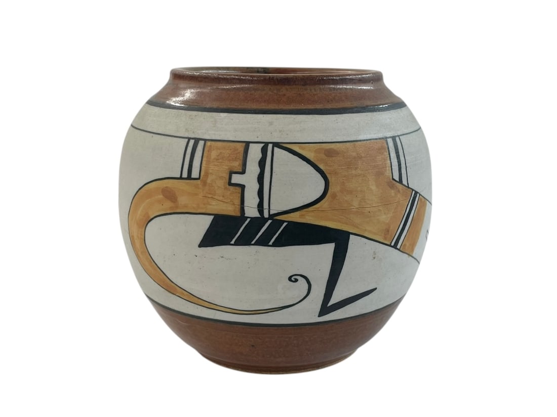 Tina Richardson Southwest Pueblo Pottery Vase: Signed: Tina 82. The design is on both front and back. One side has a crack through it, a natural firing flaw. 5" tall.