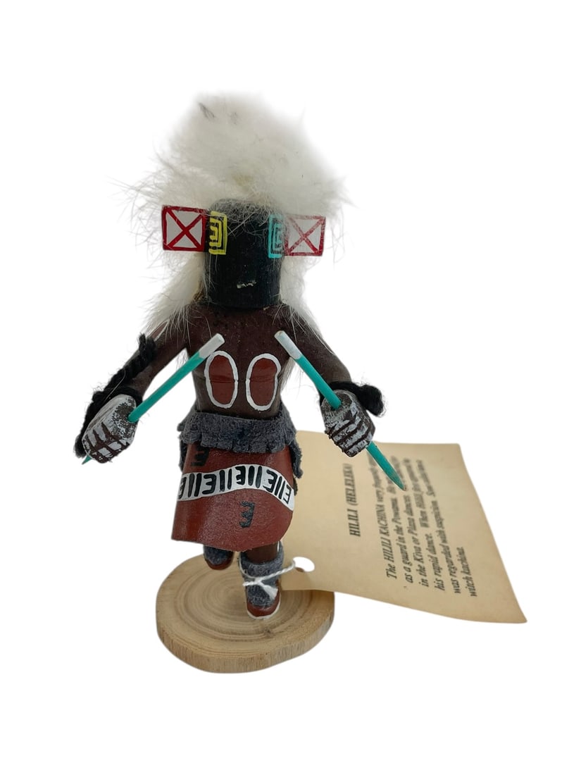 Hilili Kachina Doll Signed Achapo, 6': With original tag attached. Handmade by recognized Southwest carver Achapo, signed on the bottom. Hilili figure also known as a witch kachina. 6" tall.
