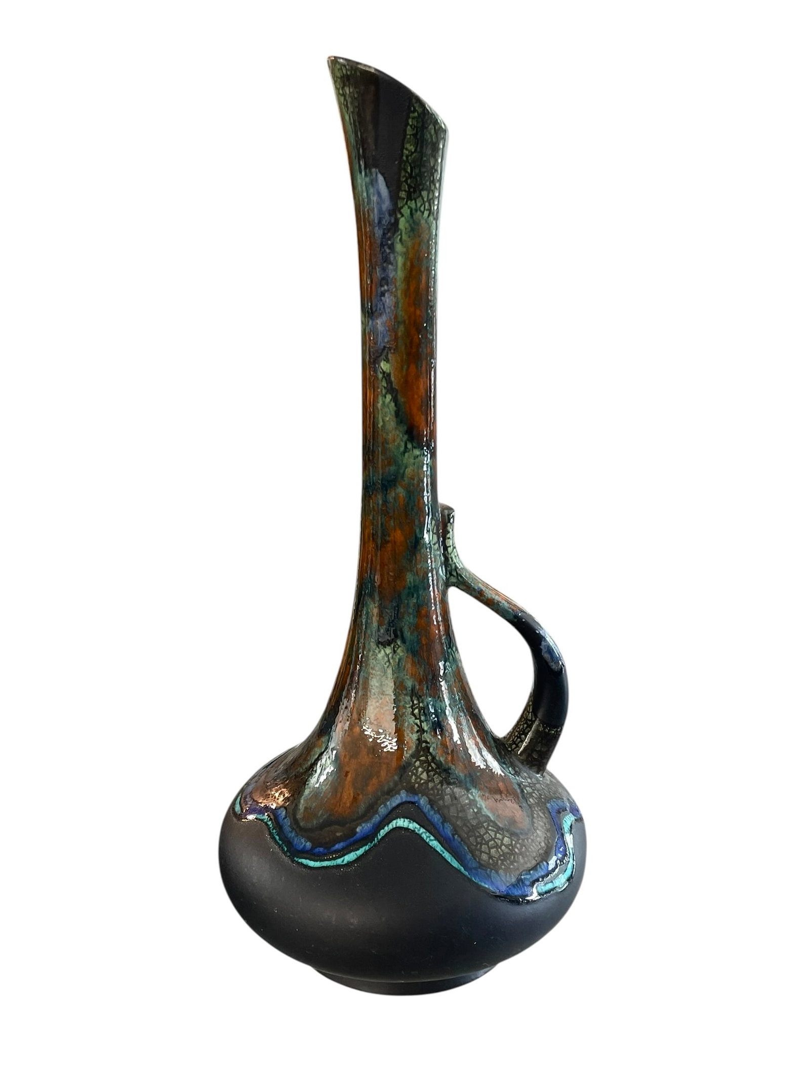 Royal Haegar MCM 18.5' Ewer Vase: Tall retro pottery, marked for Royal Haegar (#408). Great colors. There is a glaze skip on the body and a bit of black color missing on the base; no chips or cracks.