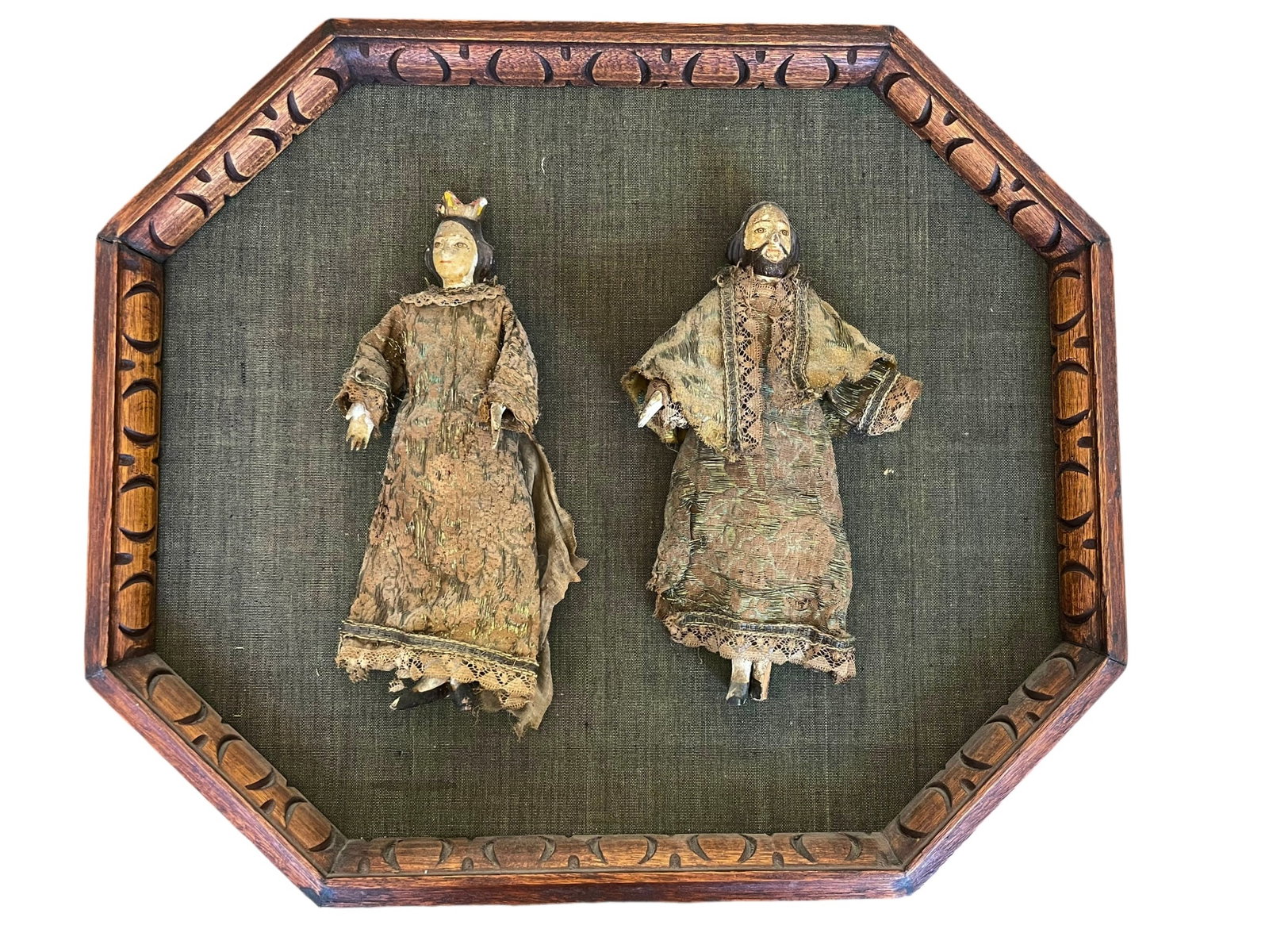 Two 17th Century German Santos Dolls, Mary and Jesus: Antique German dolls, originally from a church, having been mounted on a display board in the later 20th century. See photos for condition, which includes a missing arm and broken foot, ot
