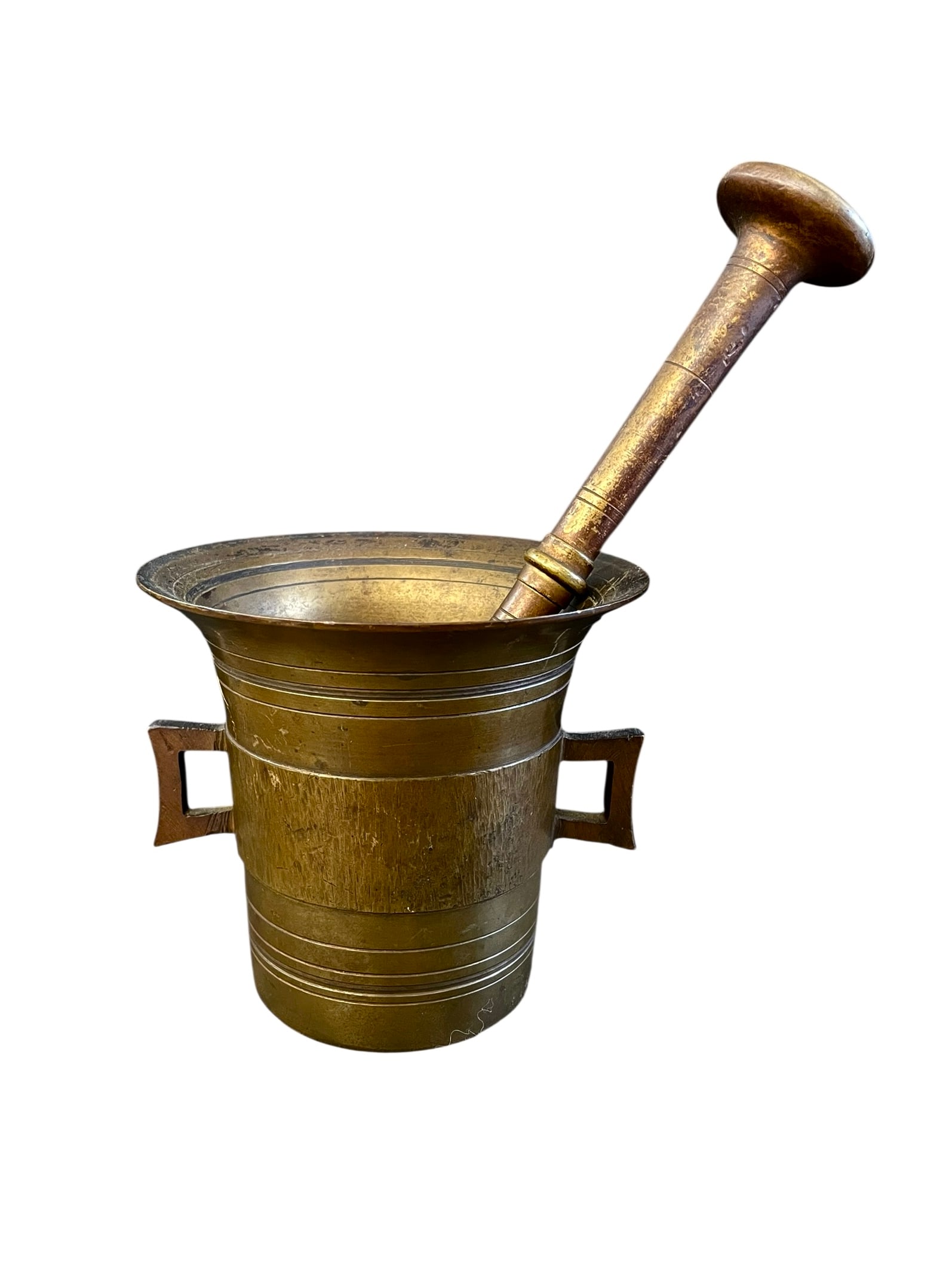 Heavy Brass Mortar and Pestle: Solid brass set with an 8 7/8" pestle. Mortar is 4 1/2" tall and 5" wide including the double handles, and has a textured band around the middle. Weight of the set is approx. 4 lbs.