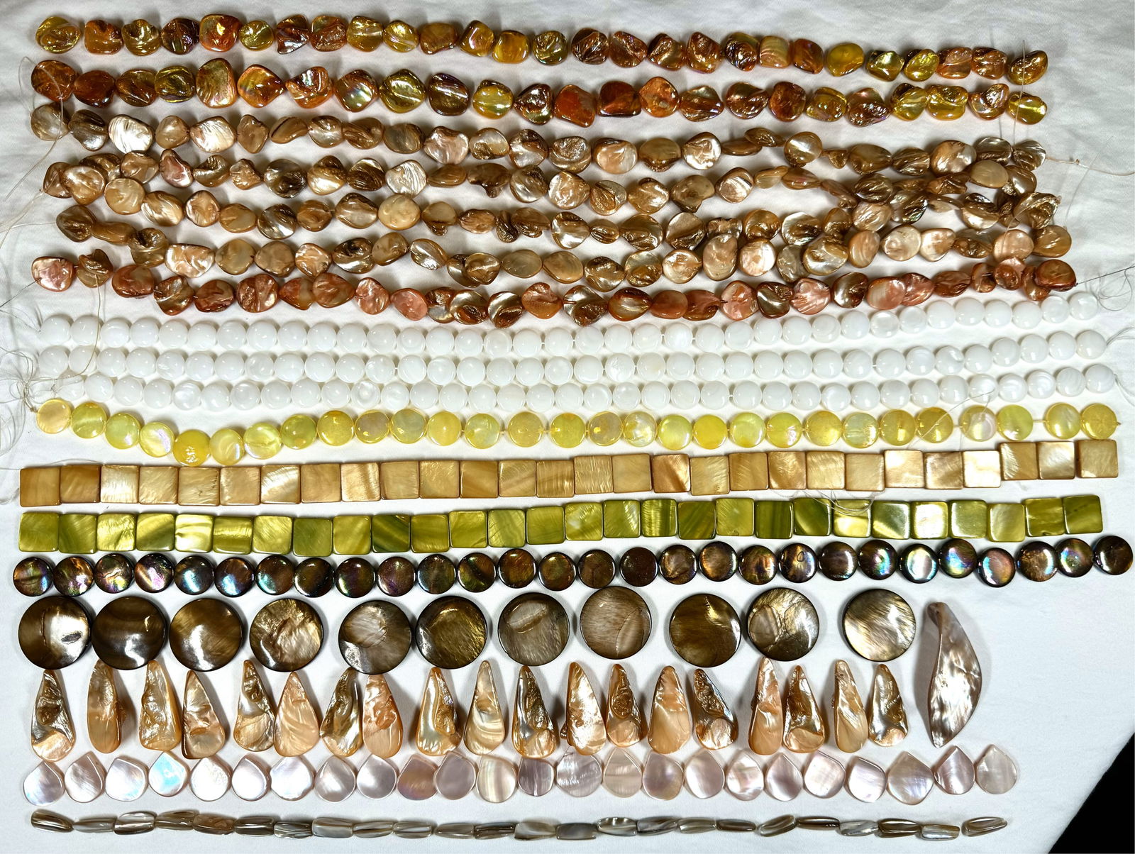 18 strands of mixed size, shape and color mother of pearl beads. (1 of 9)