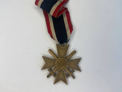 WWII German War Merit Cross with Swords. Hallmarked “101: WWII German War Merit Cross with Swords. Hallmarked “101”