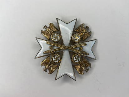 German WW2 Nazi Eagle Order 4th Class Neck Badge w/ Swords. Marked '900' and '21': German WW2 Nazi Eagle Order 4th Class Neck Badge w/ Swords. Marked '900' and '21'. Some minor enamel cracks but otherwise in good condition.