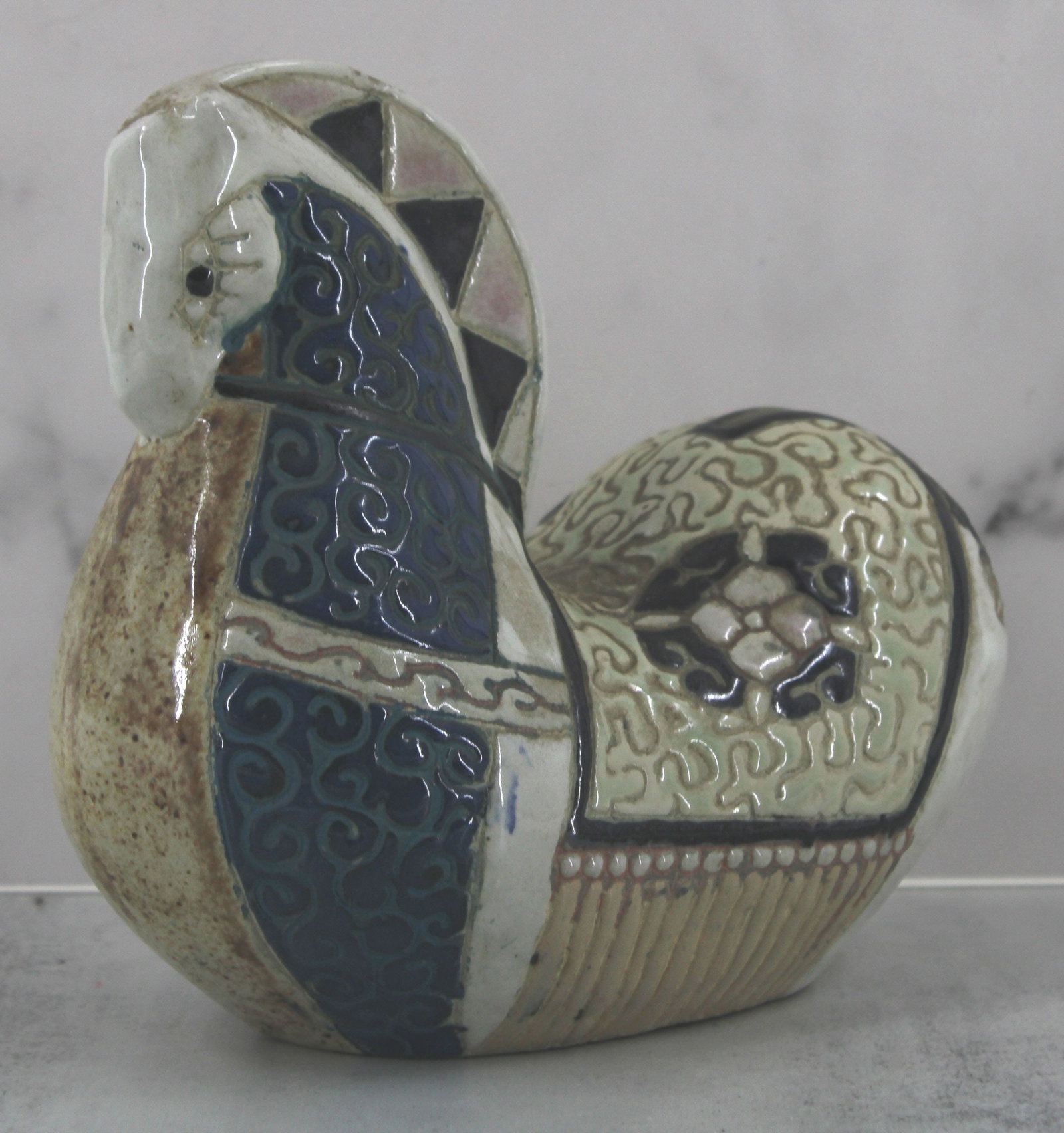 Mid Century Scandinavian Horse Coin Bank: Stylized porcelain horse with small opening to use as a coin bank. Dala Horse. Size: 5.5"T x 3.5"W x 6.25"L