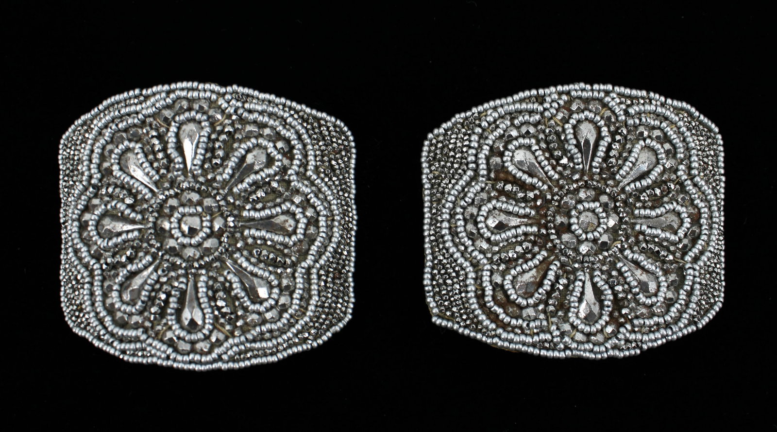 19th C. Cut Steel Shoe Buckles: 19th century cut steal shoe buckles. Made in France. Silk backing. Size: 2.5'L x 2"W