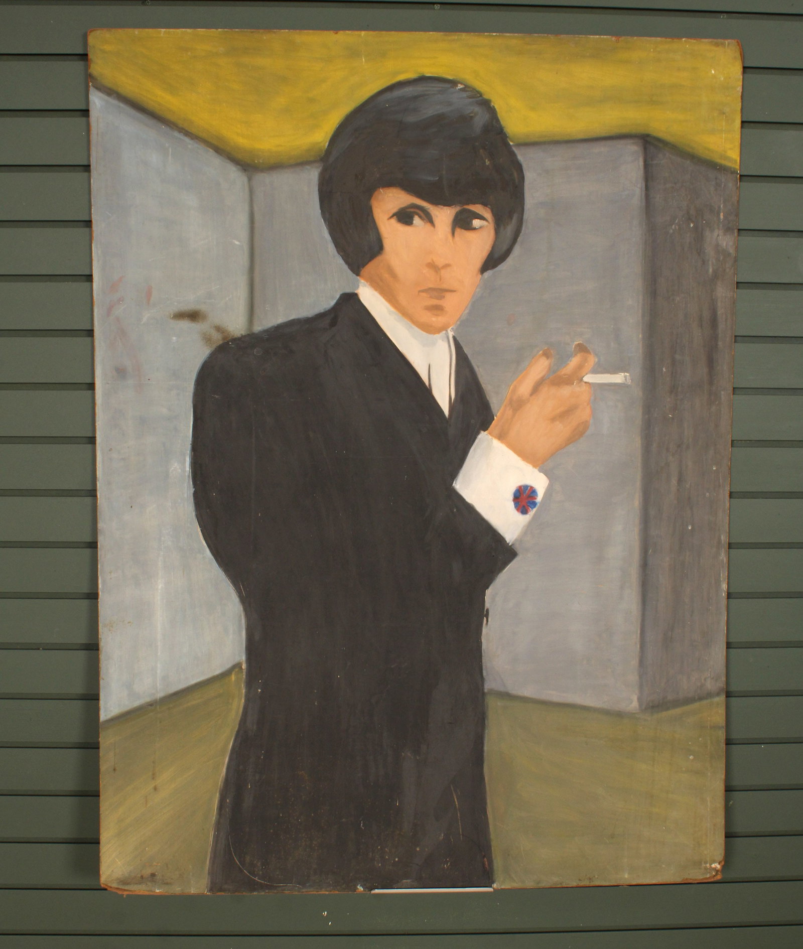 Beatles Style Portrait On Board: Mid Century painting on board of a dapper mod gentleman, he has the look of a member of the Beatles. Signed on back, Emma Sembly, some damage to corners. Size: 48"H x 36"W