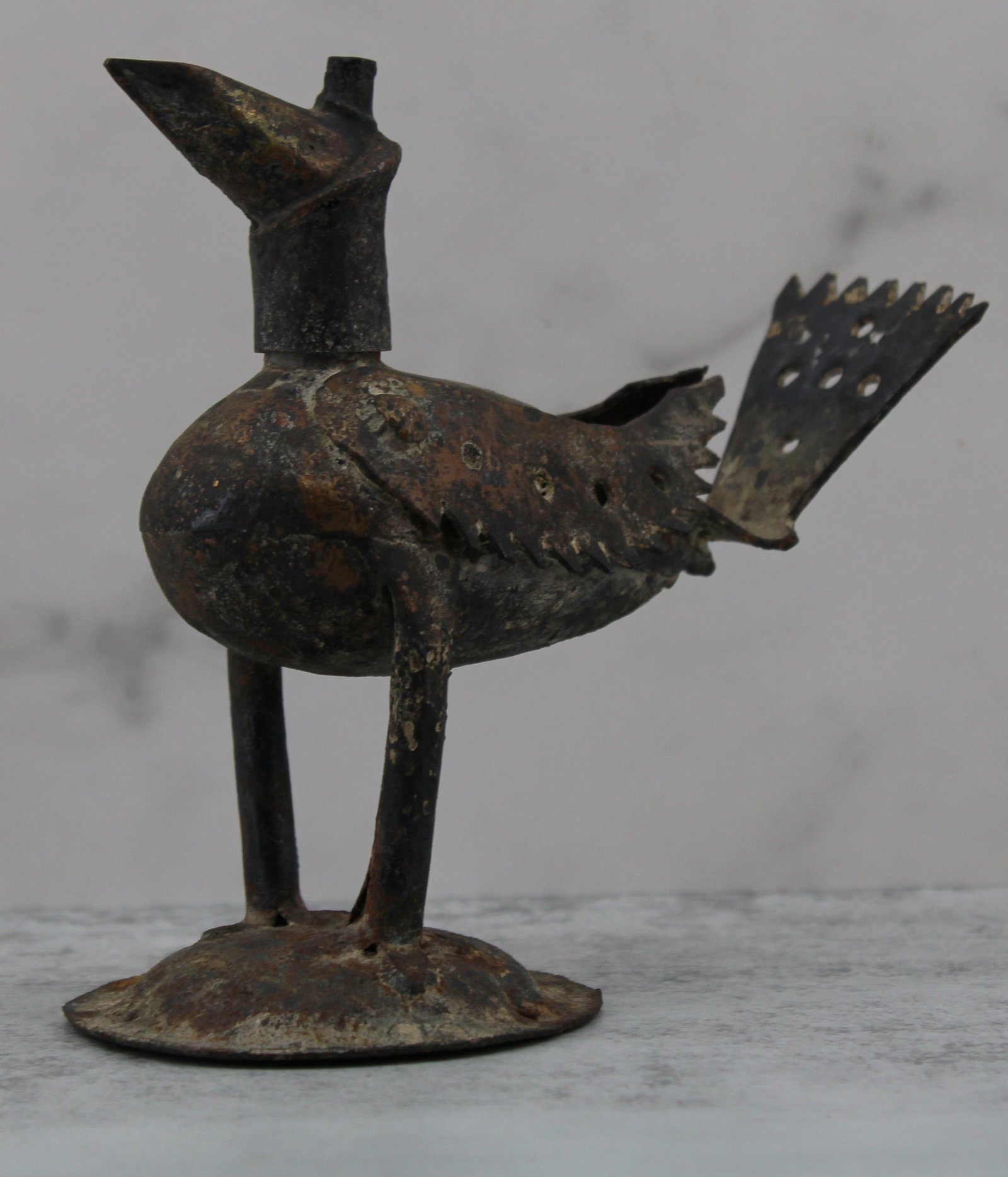 Antique Bronze Nepalese Oil Lamp in the form of a bird. Head is removable and holds the wick. Size:: Antique Bronze Nepalese Oil Lamp in the form of a bird. Head is removable and holds the wick. Size: 5"T x 5"L x 3"D