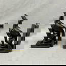 Vintage bookends, greyhounds seated on books.  Resin/ composite, paint and finish losses. Size:  9"T