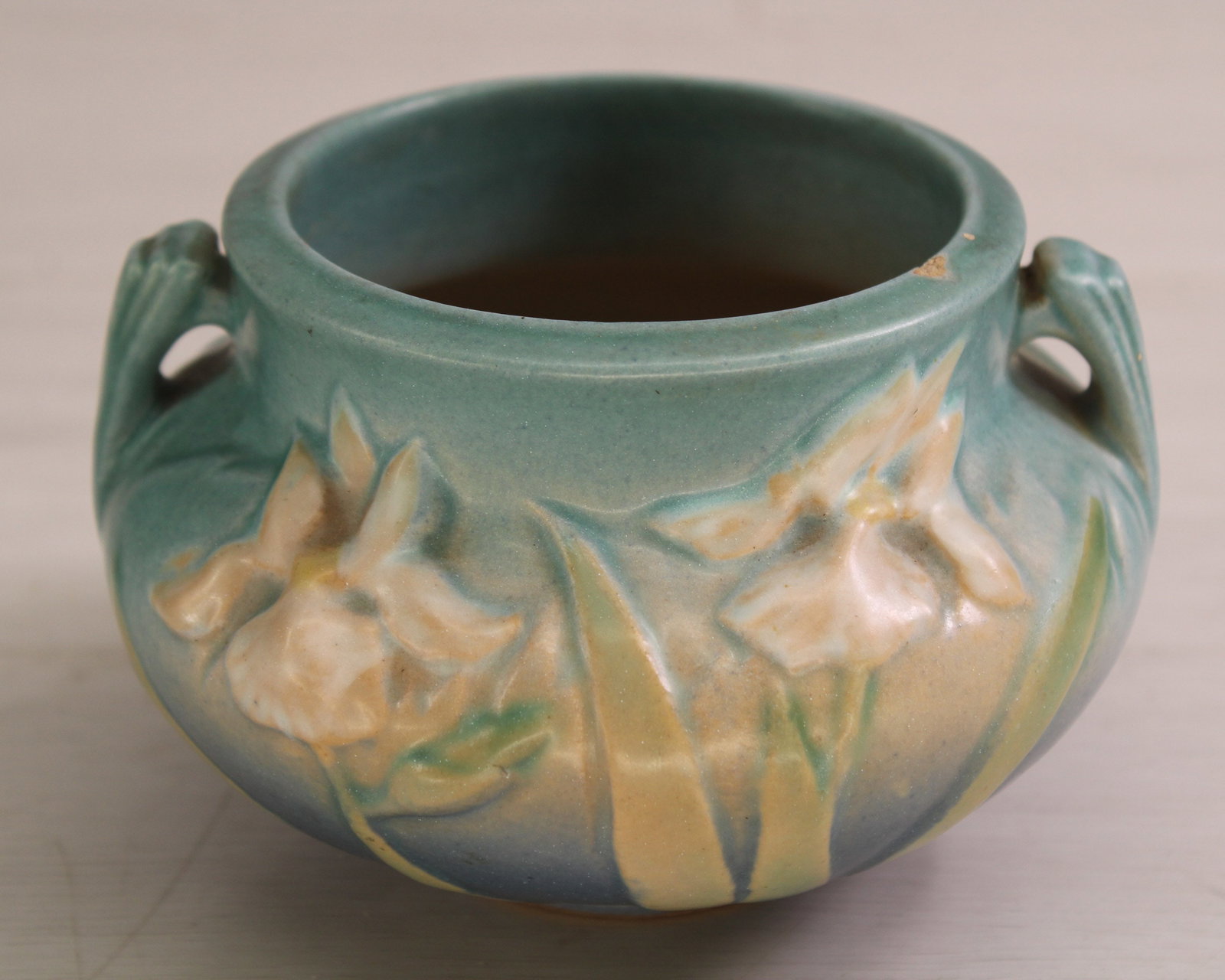 Roseville Pottery jardiniere, two handled urn form  planter, lily floral design, signed on bottom. (1 of 8)