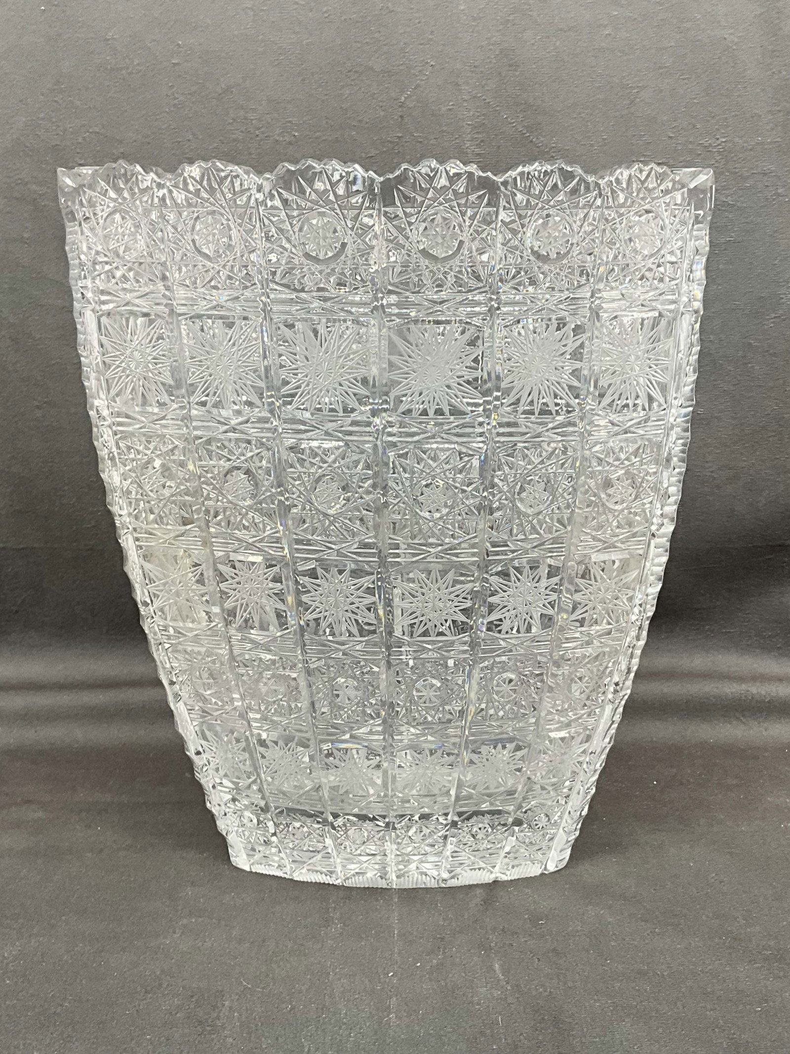 A vintage cut glass vase with a thick wall, &  in  the style of Queens Lace pattern. Size: 9.5"T x (1 of 10)