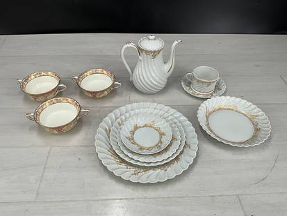 Tea pot, tea cup & saucer, 5 plates, 3 bowls. Gold  details on all. Royal Worcester England &: Tea pot, tea cup & saucer, 5 plates, 3 bowls. Gold details on all. Royal Worcester England & Haviland France. Size: 7.5"T x 7.5"W x 4.5"D teapot, 10.5" diameter largest plate
